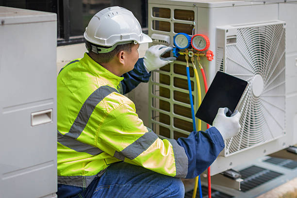 Professional Hvac technician working in Needham, MA